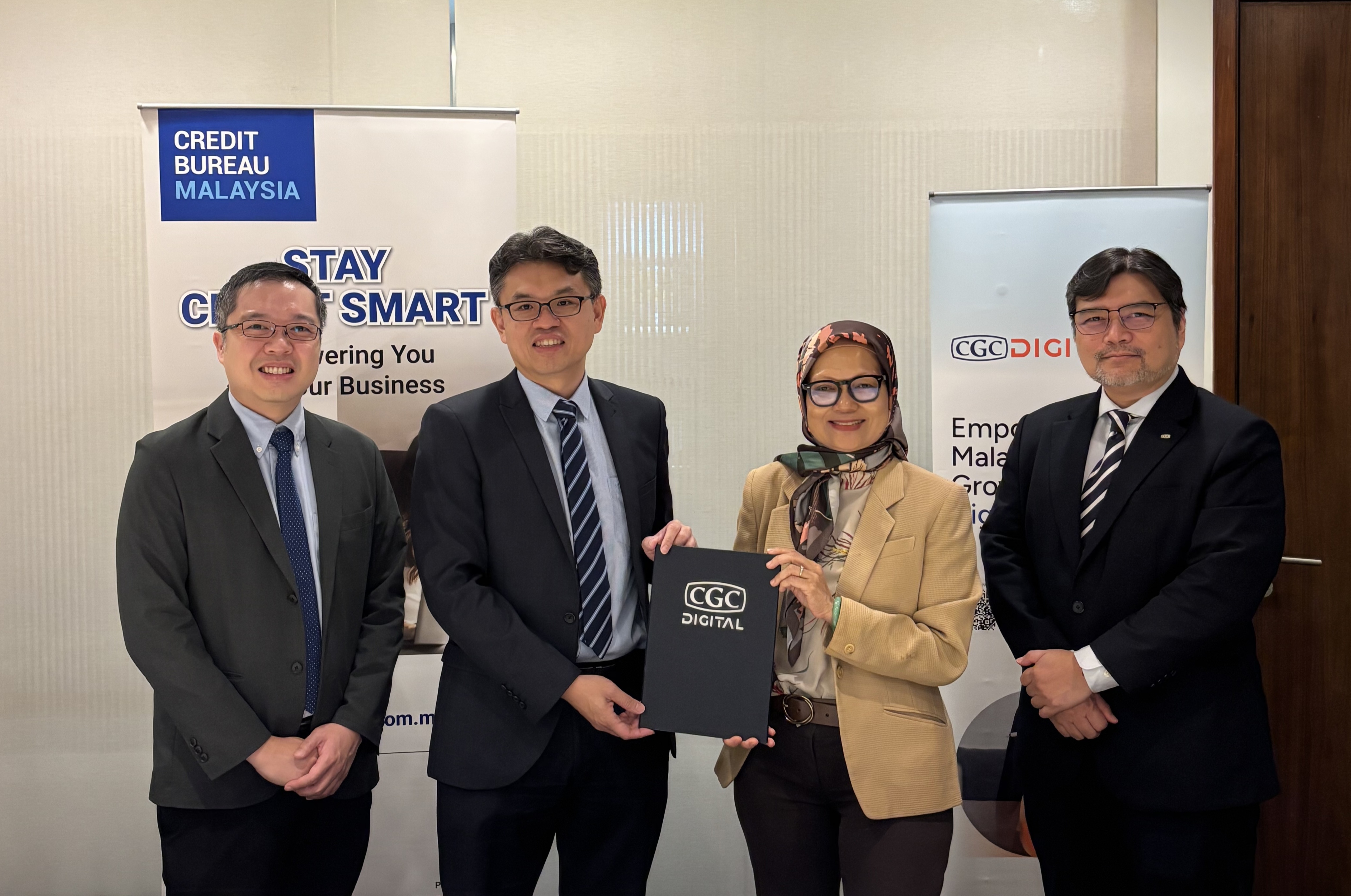 (From left) Evan Cheah, Deputy President of Sunway Group and Chairman of Credit Bureau Malaysia; Soo Chin Kang, Chief Executive Officer of Credit Bureau Malaysia; Yushida Husin, Chief Executive Officer of CGC Digital; and Mohamed Nazri Omar, President and Chief Executive Officer of Credit Guarantee Corporation Malaysia Berhad (CGC).